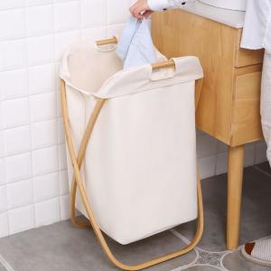 China Household Essentials Oem Bamboo Laundry Hamper Basket Collapsible X Frame on sale