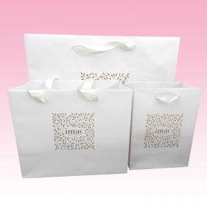 Quality custom white paper gift bags manufacturer with 300gsm art paper for sale