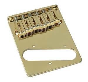 Quality china CNC Machined Parts of Gold Plated Bass Bridge Plate for Guitar Fittings manufacturer for sale