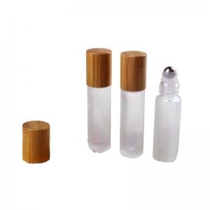 China Wood Grain Bamboo Cap 3ml 5ml 10ml Frosted Roller Bottles With Stainless Roller Ball on sale