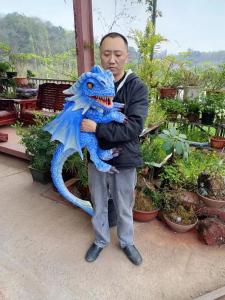 China Hot Sale Kids Attractive Dinosaur Hand Puppet Simulation Baby Dinosaur Puppet Model on sale