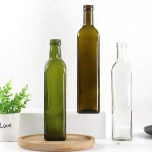 Quality Green Glass Round Olive Oil Bottle With Lid Olive Oil Bottle with Logo Customization for sale