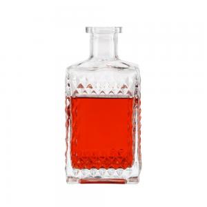 China Customied Square Carved Glass Reed Diffuser Bottles with Whiskey Vodka Wine Bottle Color on sale