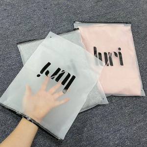 China Customized White Matte Frosted Peva Zipper Slider Plastic Bags Waterproof With Your Logo For Clothing Hoodies Packaging on sale