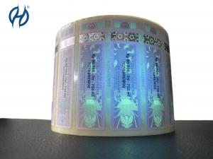 China Fragile Tax Stamp Sticker Custom Paper UV Light Effect Logo Gold Stamping Label on sale