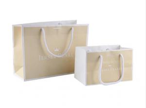 Quality Customized Size Paper Shopping Bags With Silk Ribbon / Circle Tube Handle for sale