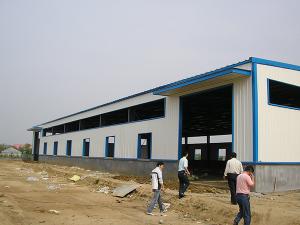 China Wide Span Steel Structure Warehouse Painted Galvanized Surface Treatment on sale